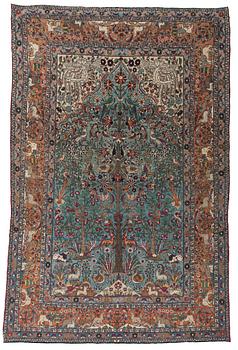 A CARPET, a semi-antique Teheran figural, 303,5 x 198-205,5 cm.