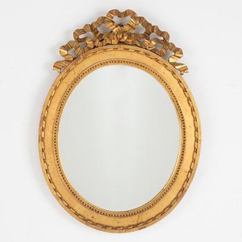 A Gustavian style mirror, early 20th Century.