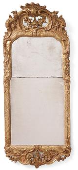 A Swedish rococo giltwood mirror, later part of the 18th century.