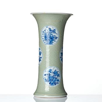 A Chinese blue and white celadon-ground beaker vase, Qing dynasty, Kangxi (1662-1722).