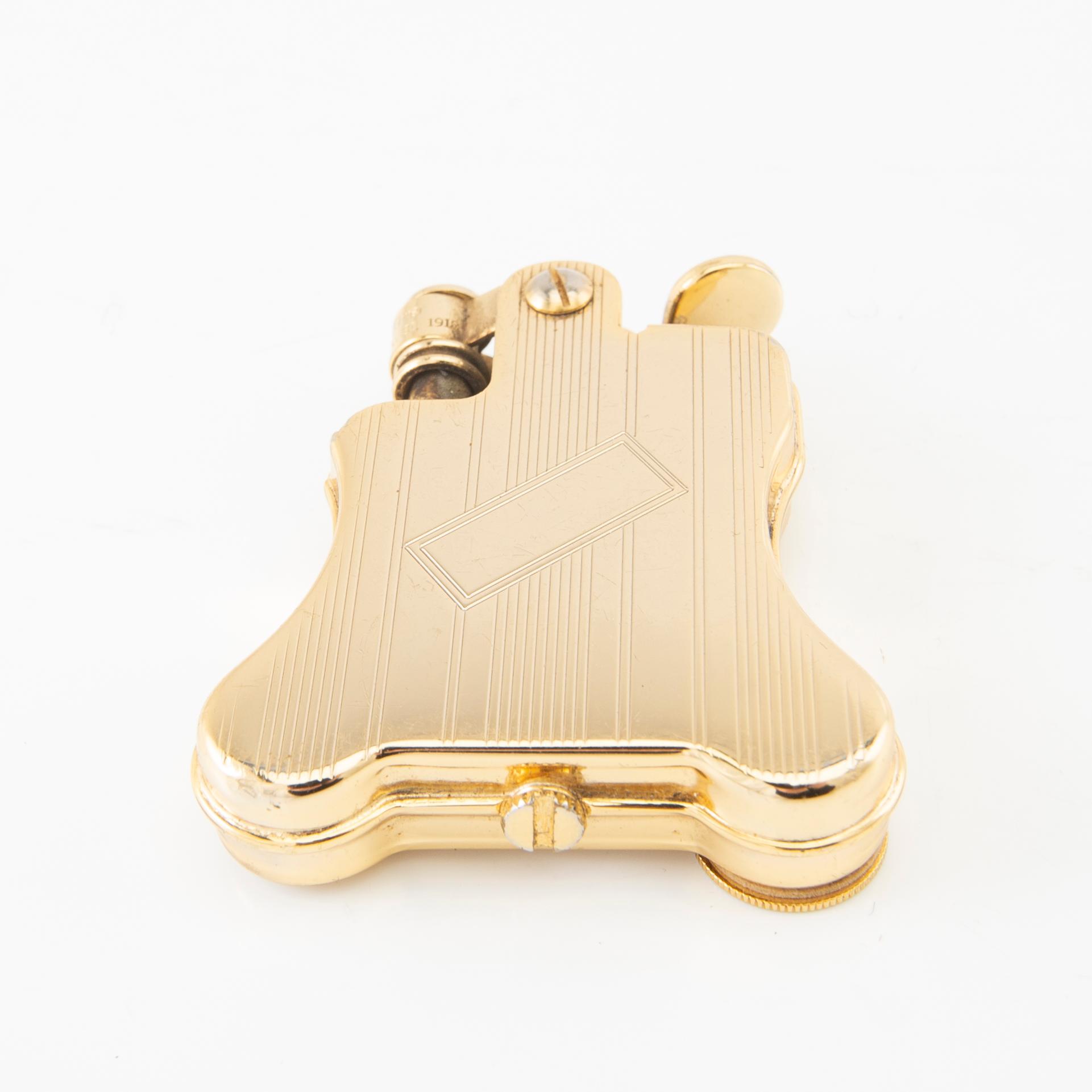 Ronson "Banjo" lighter patented 1918 USA.