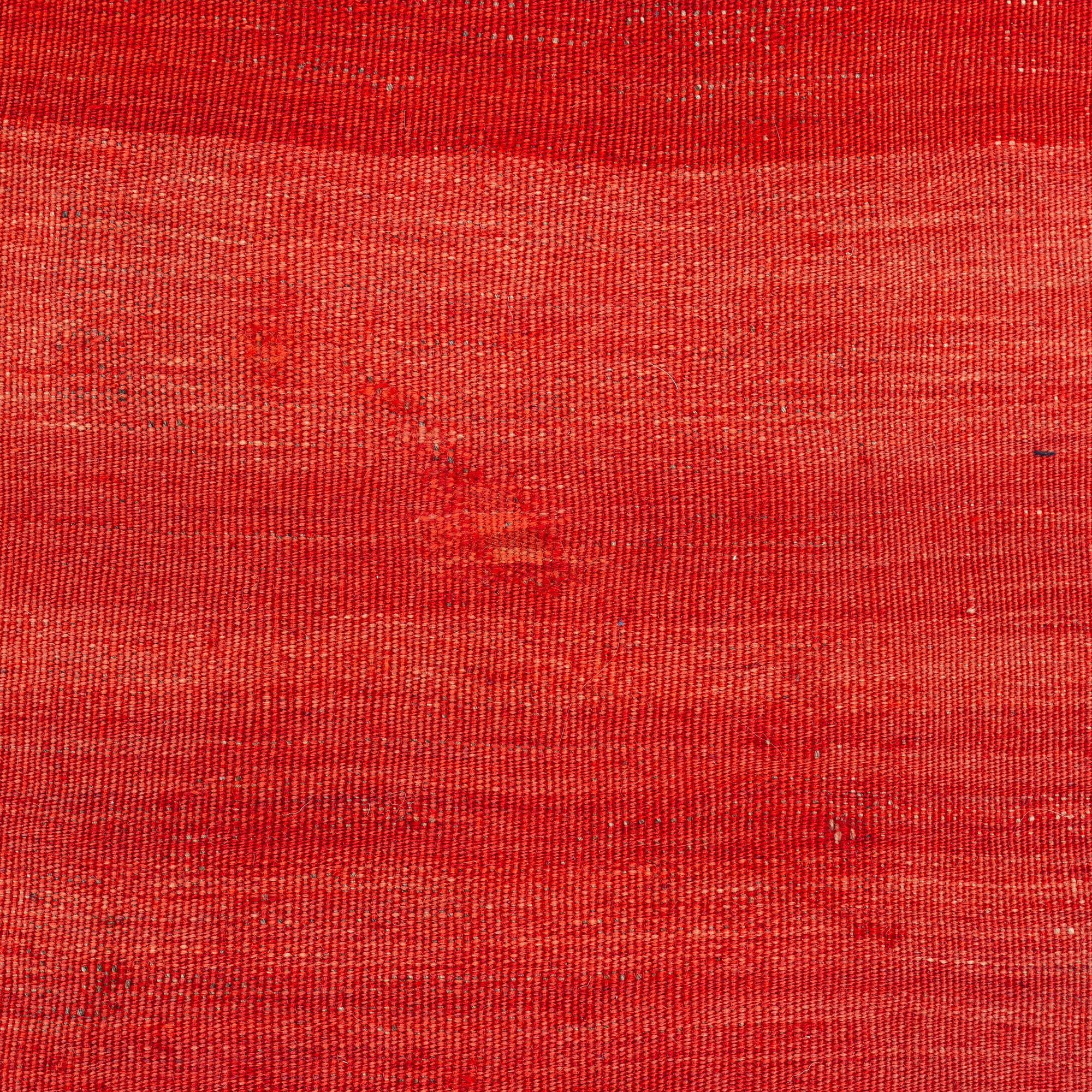An antique Qashqai kilim rug, approximately 240 x 155 cm.