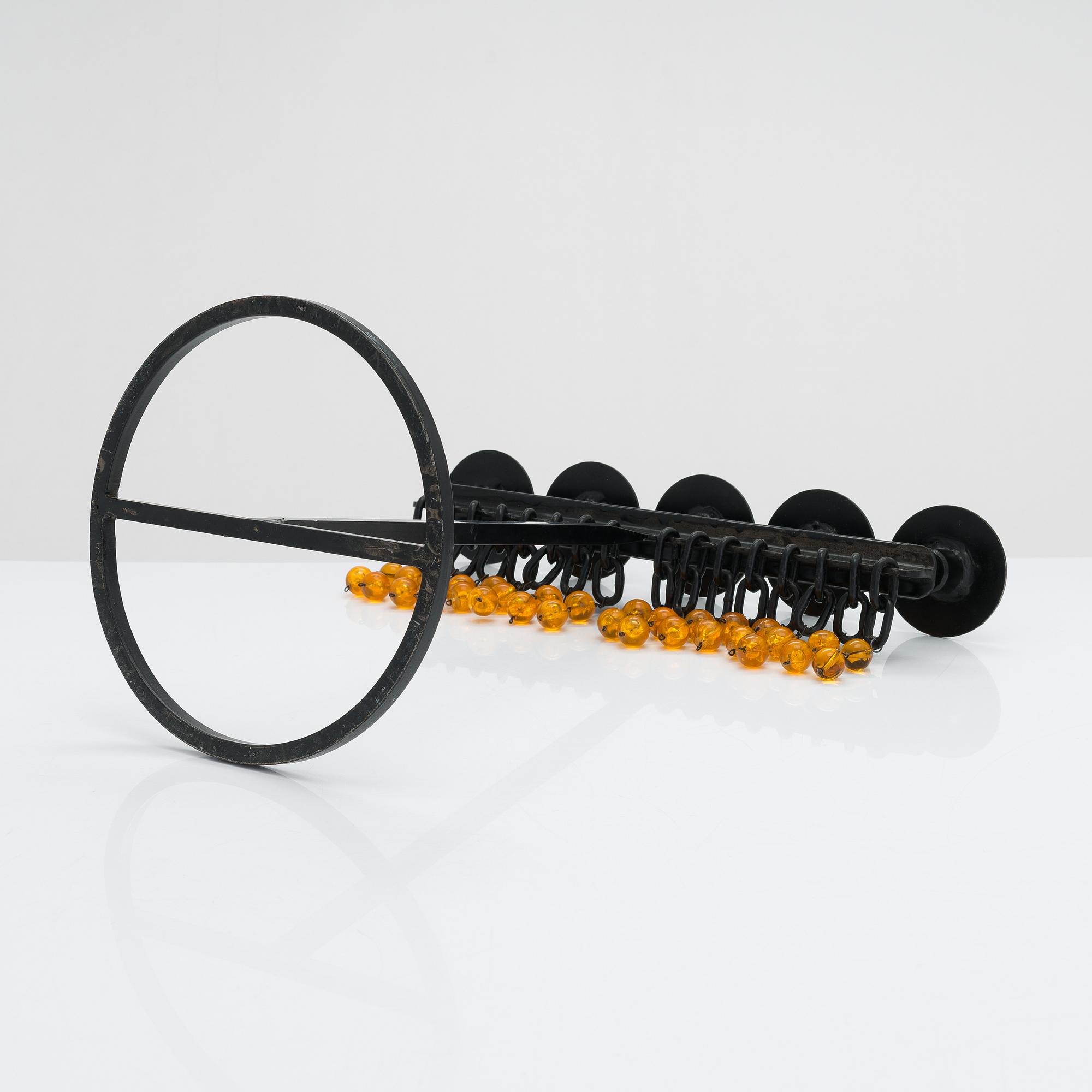 A wrought iron candlestick by Kaija Aarikka, Finland.