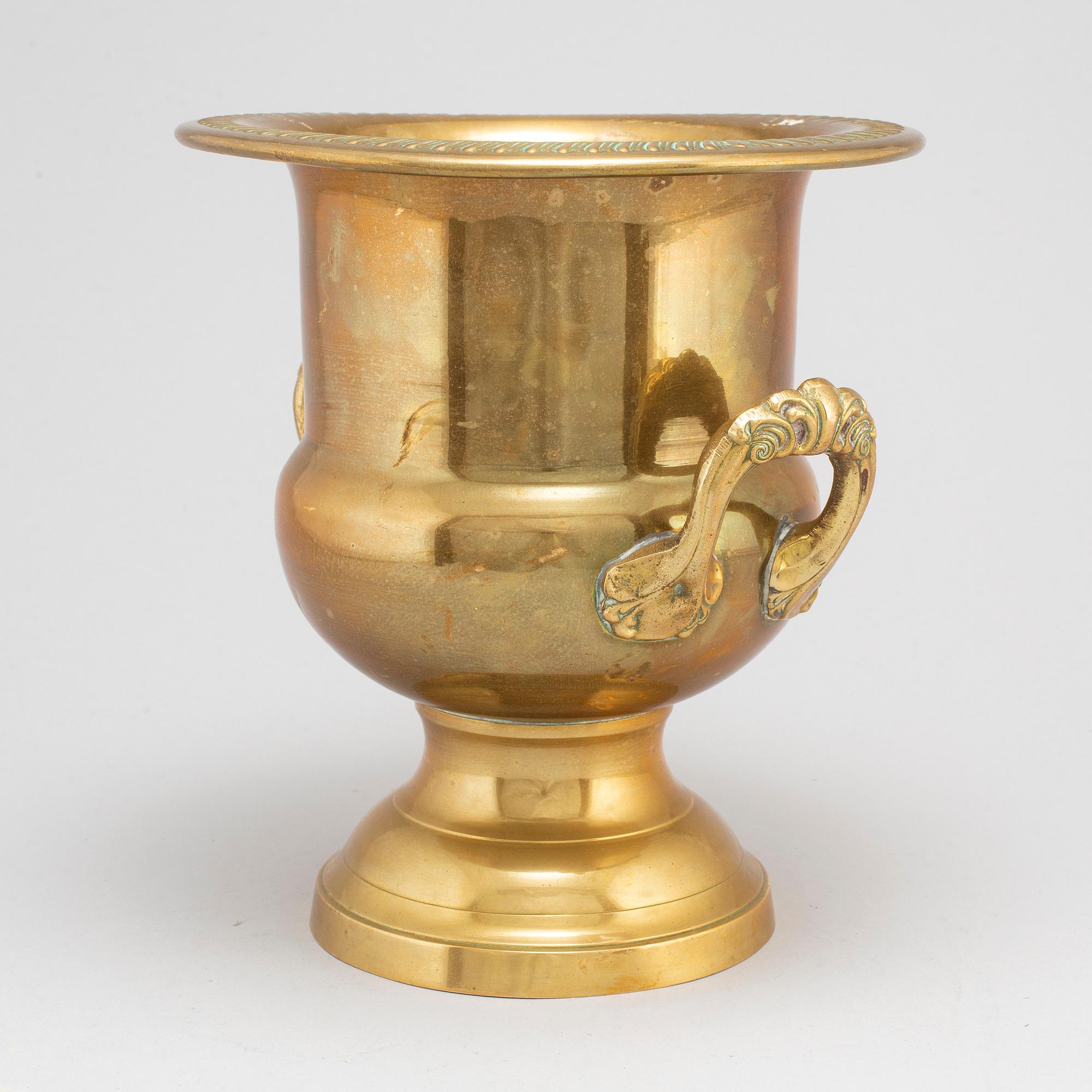 A first half of the 20th century brass champagne cooler.