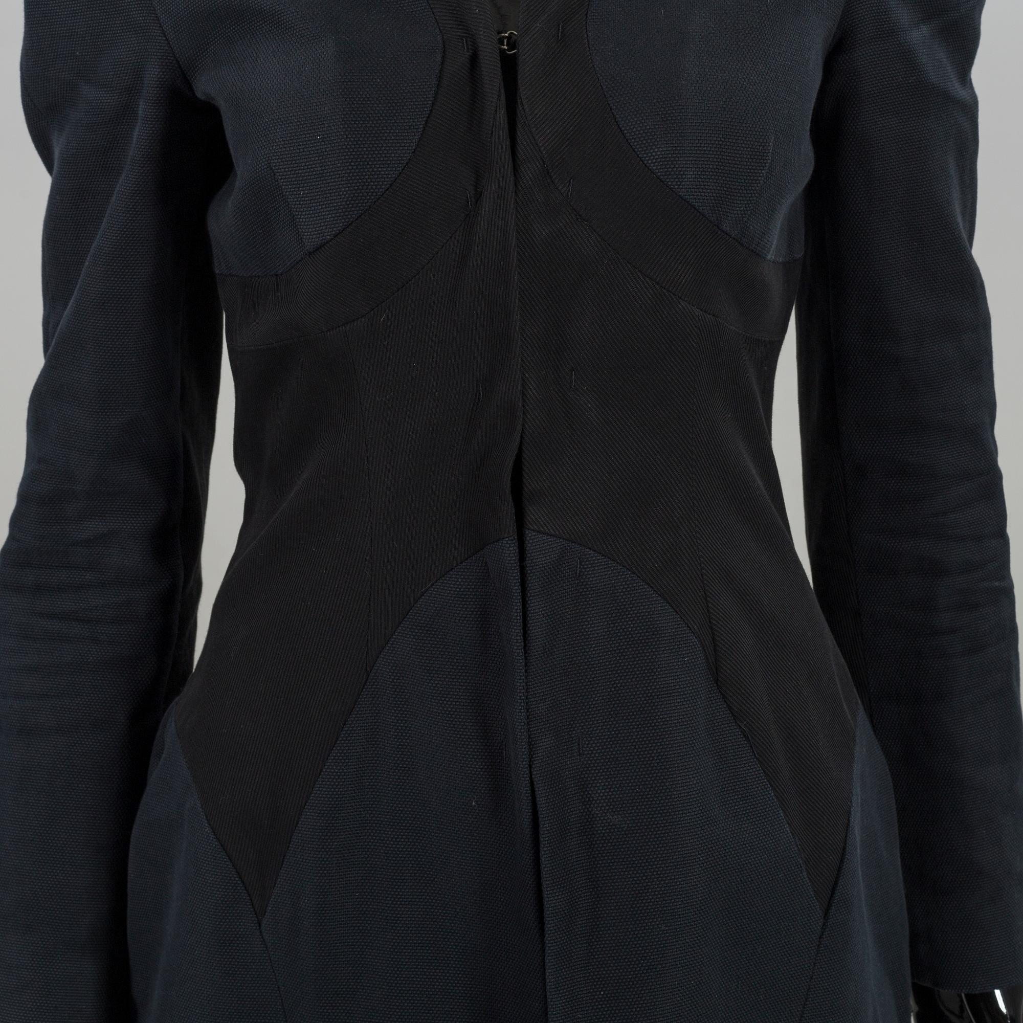 A McQ (Alexander McQueen) COAT. It size 42.