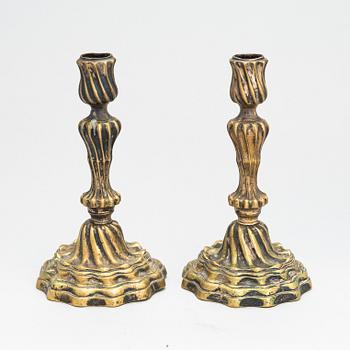 A pair of Louis XV argent haché candlesticks, France 18th-century.