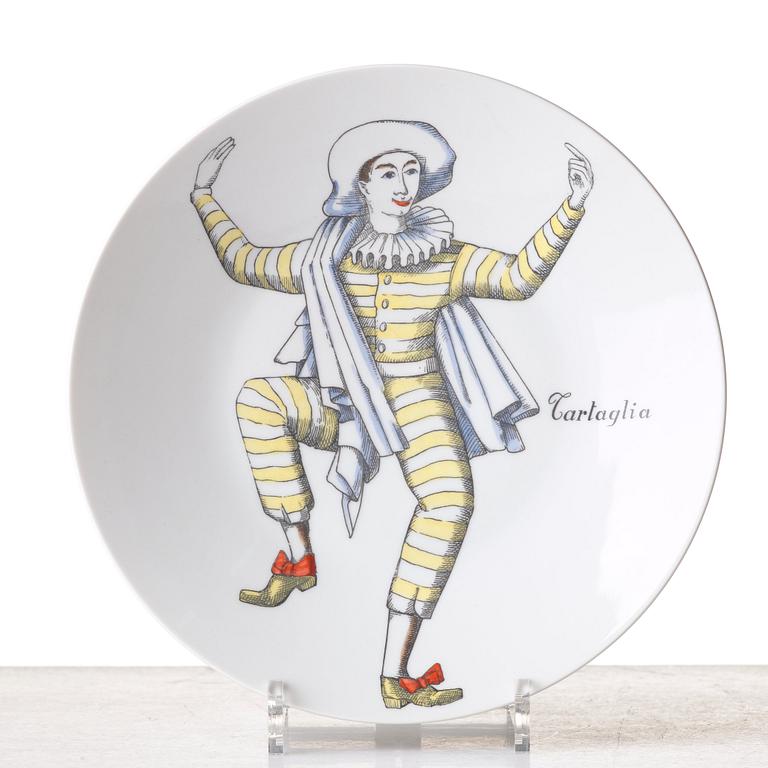 Piero Fornasetti, a set of 12 "Maschere Italiane" porcelain plates, Milan, Italy.