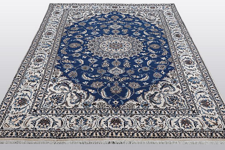 A carpet, Nain, part silk 9 LAA, ca 310 x 203 cm.