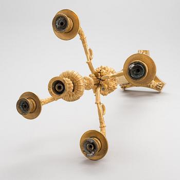 A latter half of the 19th-century candelabrum/ table light, altered in the 20th century.