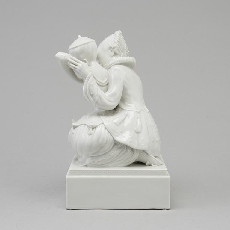 A white glazed Royal Copenhagen porcelain figure, Gerhard Henning, Danmark, 1920's.