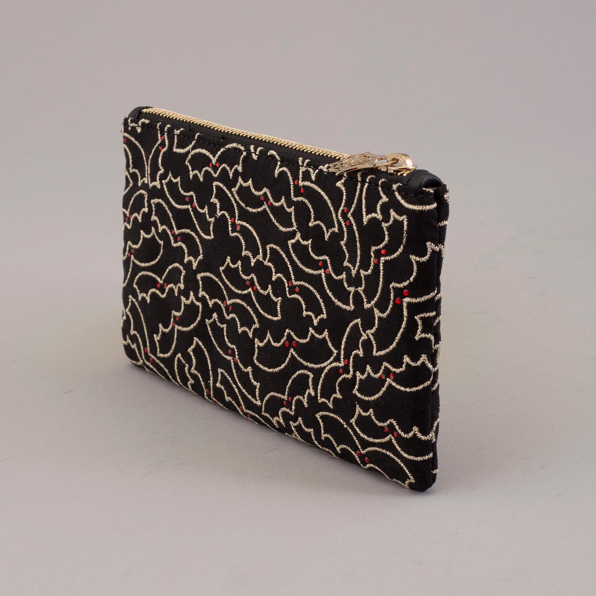 CLUTCH, Charlotte Olympia.