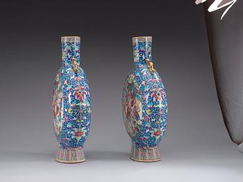 A pair of large famille rose moon flasks, Qing dynasty, 19th Century.