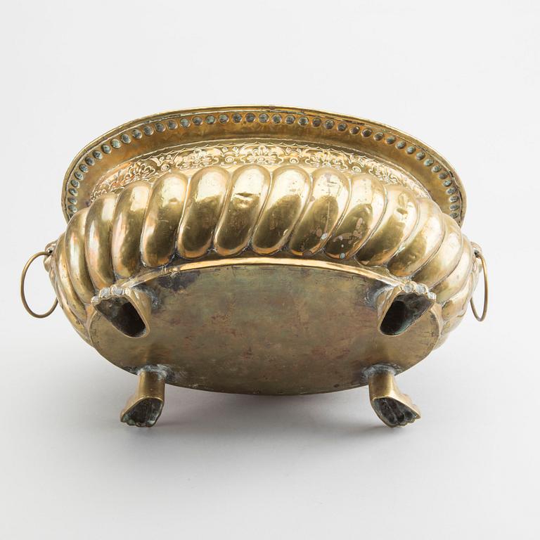 A Baroque style brass vine cooler 19th century.