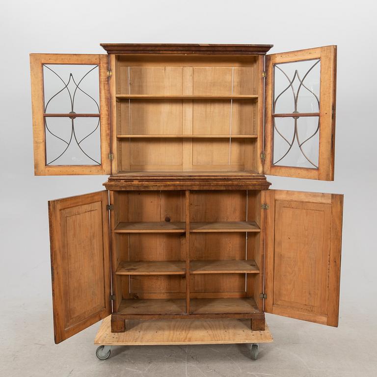 A mid 1800s mahogany book cabinet.
