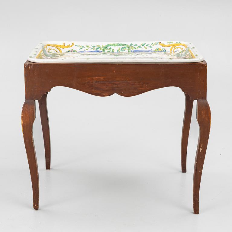 A Swedish rococo tea table with an associated top, 18th and 20th century.