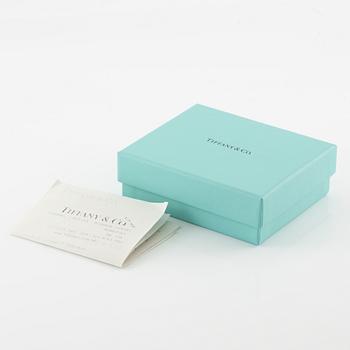 Tiffany & Co,.
