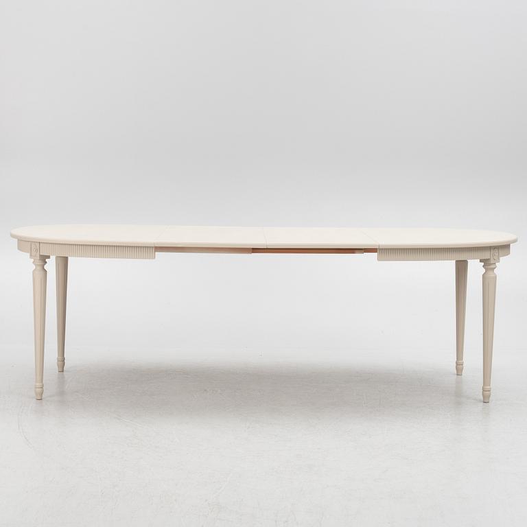 A Gustavian Style Dining Table and 10 Chairs, second half of the 20th Century.