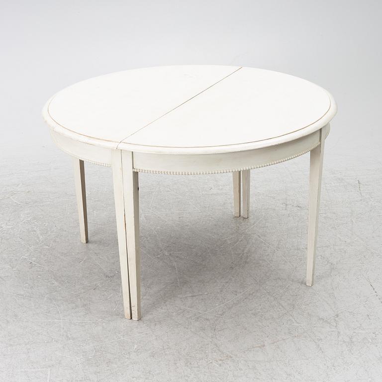 A Gustavian style dining table, late 20th Century.