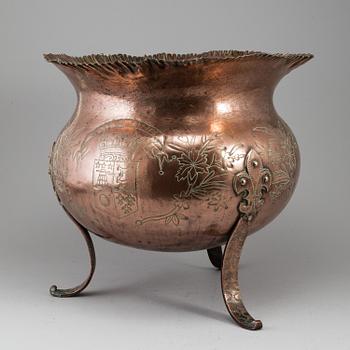 A 19th century copper flower pot.