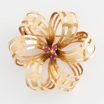 Brosch 18K guld med rosa stenar.