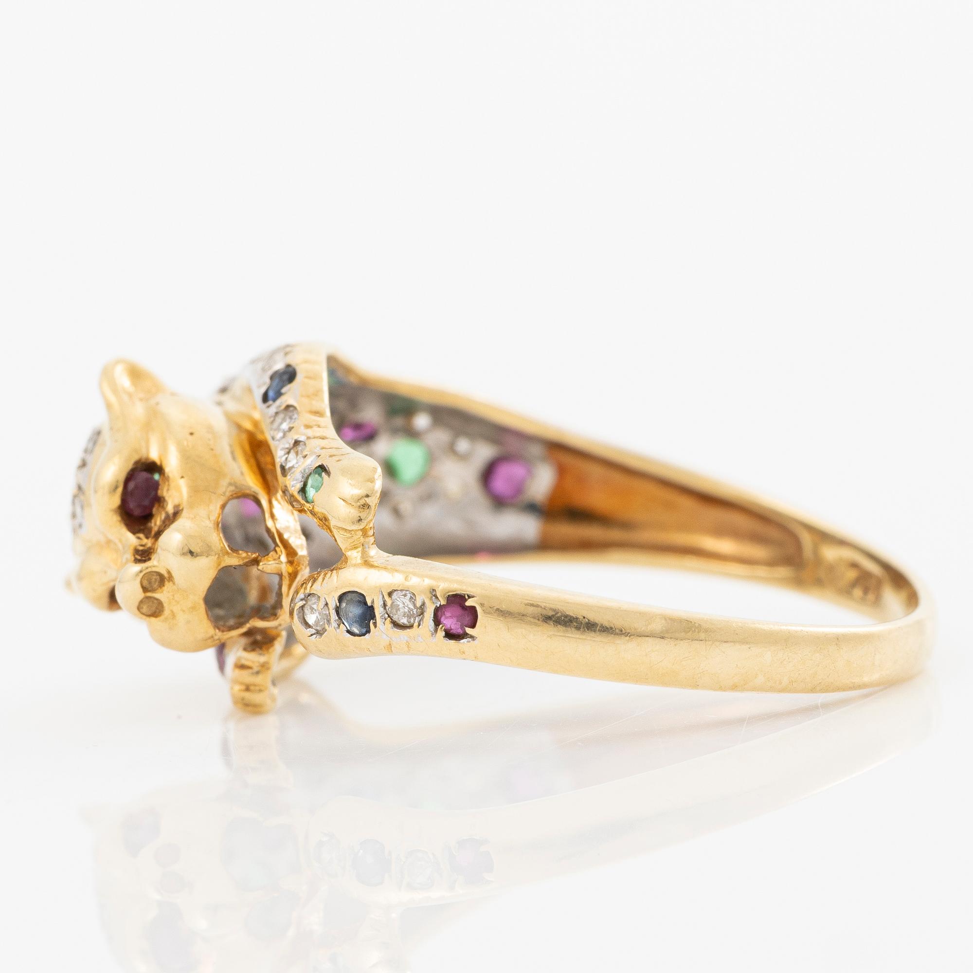 18K gold ring in the form of a panther with rubies, emeralds, sapphires and diamonds.