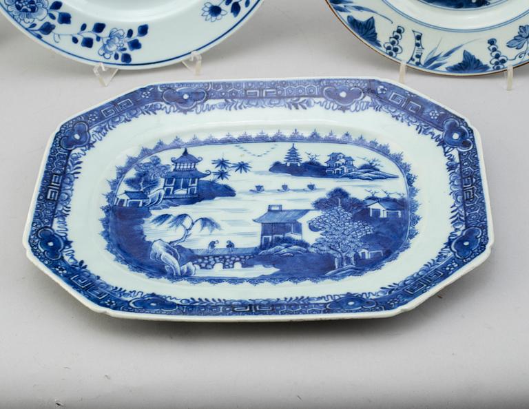 Four blue and white export porcelain plates, three soup plates and a serving dish, Qing dynasty, Qianlong (1736-95).