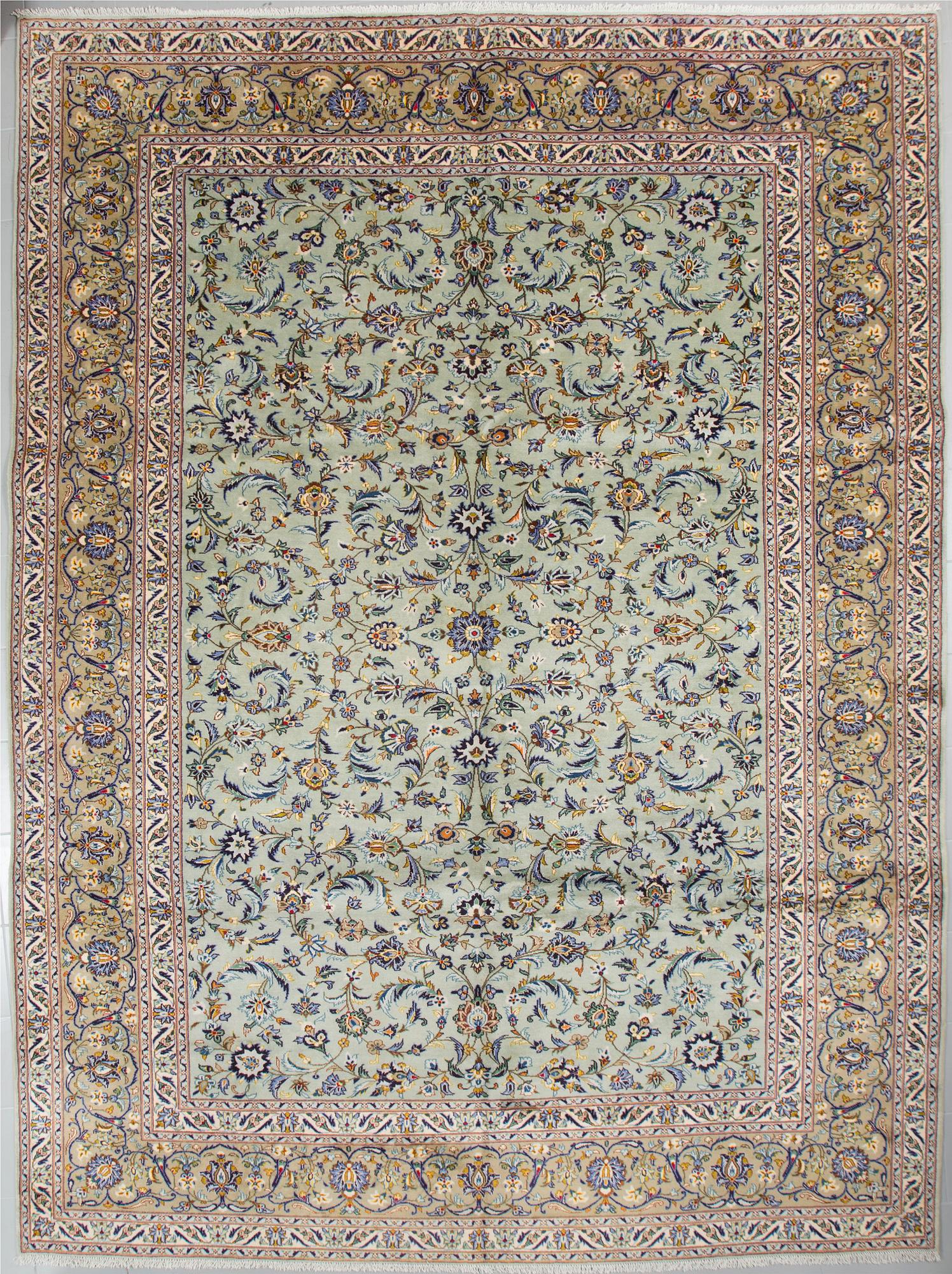 A Keshan rug, 412 x 305 cm.