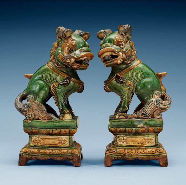 A pair of seated Buddhist lions, 17th Century.