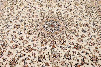 A Keshan carpet, c. 355 x 240 cm.