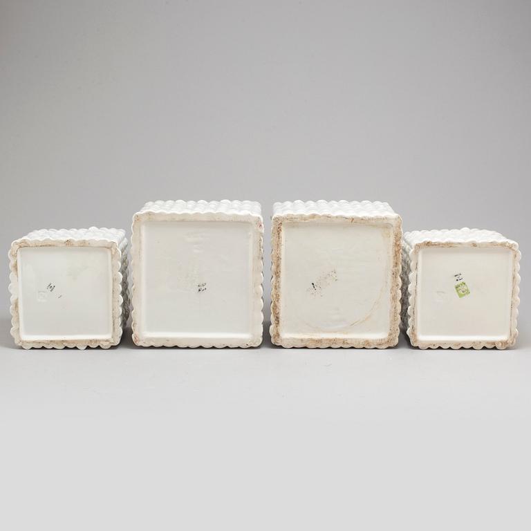 a set of four ceramic flower pots from Italy in the second half of the 20th century.