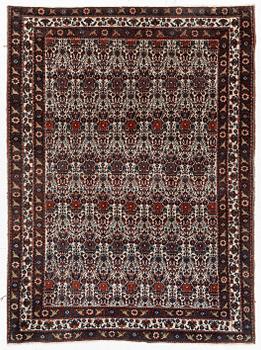An antique/semi-antique Abadeh rug, Western Iran, c. 202 x 150 cm.