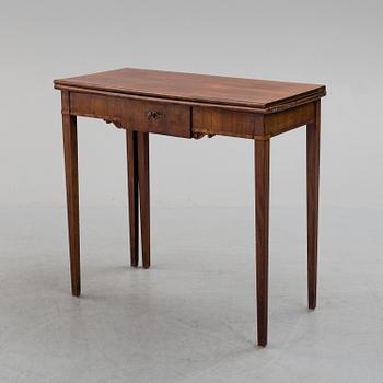 An early 19th century mahogany card table.