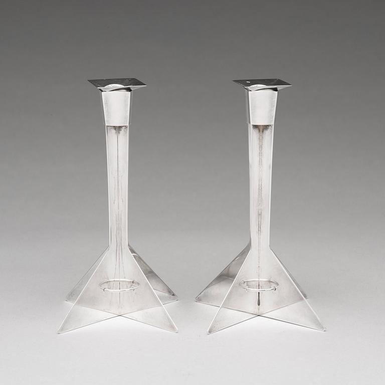 Hubert Hydman, a pair of sterling candlesticks, Stockholm 1988.