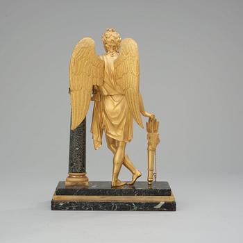 A French Empire early 19th century gilt bronze and verde antico marble table sculpture.