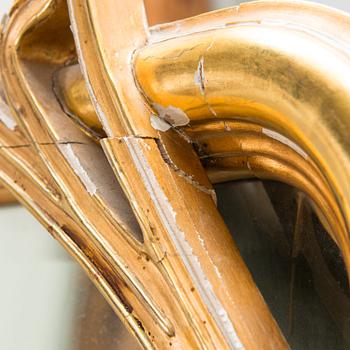 An Art Nouveau mirror with console table from early 20th century.