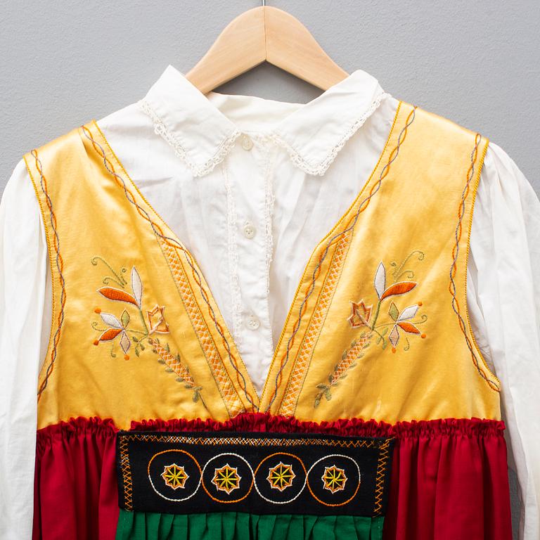 a traditional dress, size ca medium.