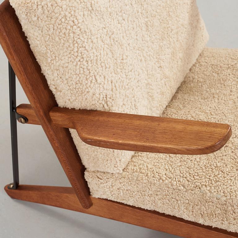 Børge Mogensen, an oak and iron easy chair, Fredericia, Denmark 1950's.