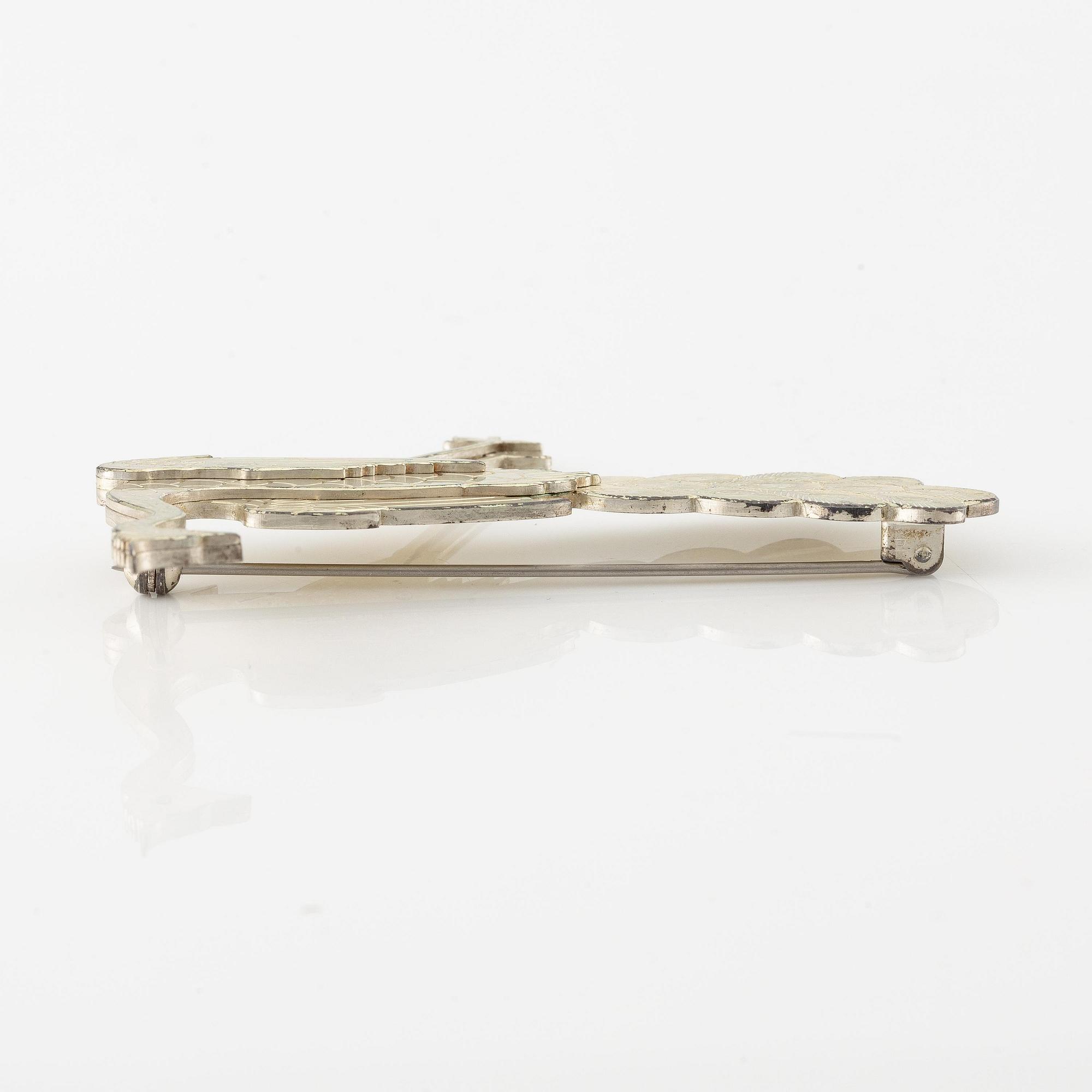 Wiwen Nilsson, a brooch, sterling silver, in the form of a peacock, Lund 1959.