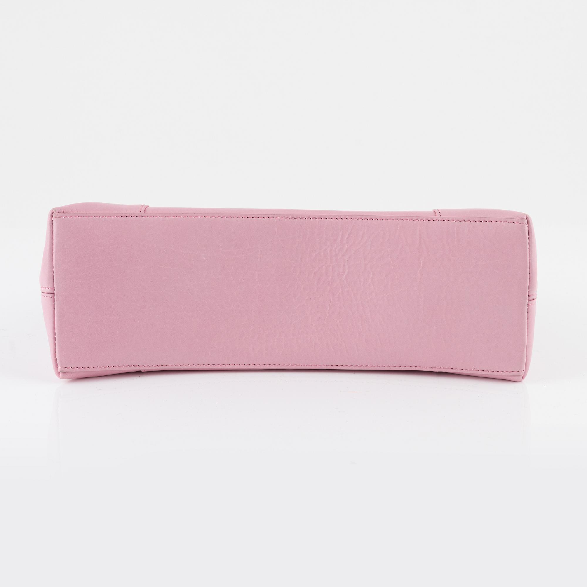 Balenciaga, a pink leather 'Downtown' bag.