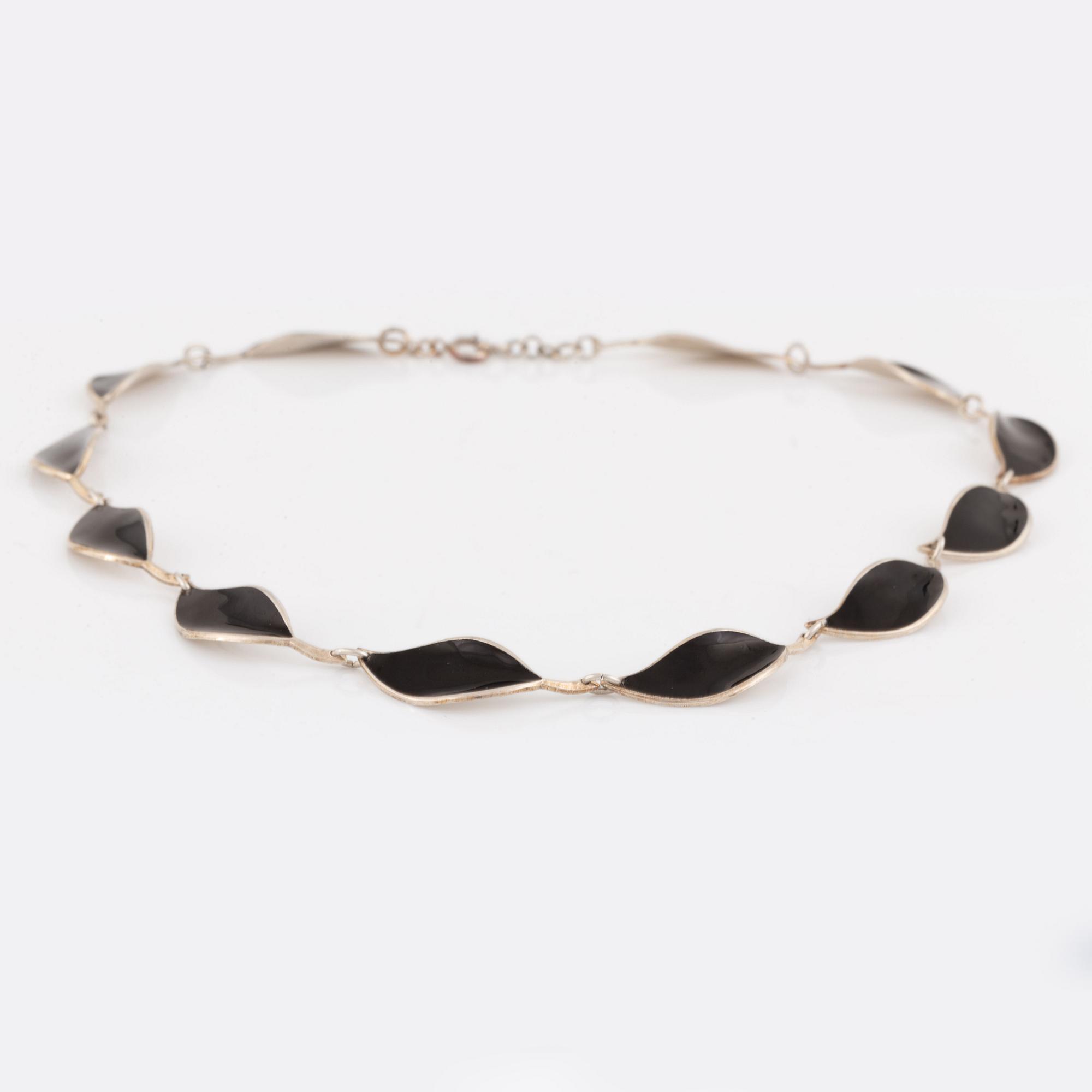 David Andersen, necklace and two brooches, silver and enamel.