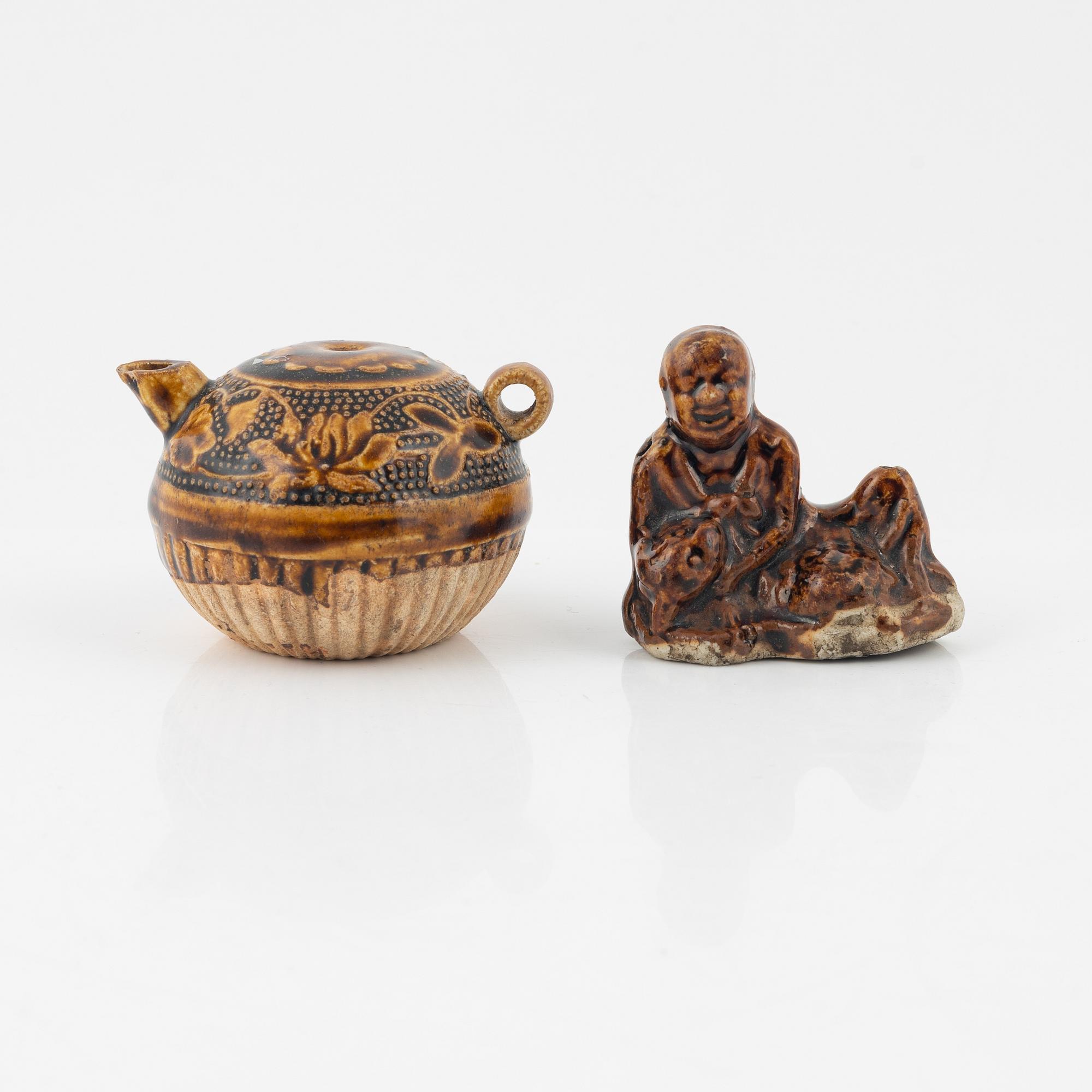A brown glazed water dropper and a brush rest, Qing dynasty, 19th Century.