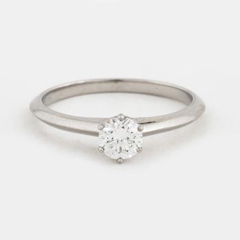 A brilliant cut diamond ring by Tiffany & Co.