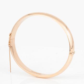 ARMRING, 14K guld.  Finland 1965. Total vikt 14,2 g.