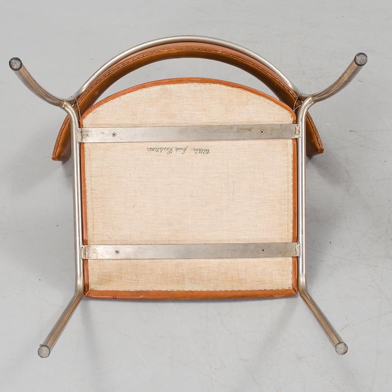 A pair of Erik Karlström leather upholstry chairs, circa 1965.