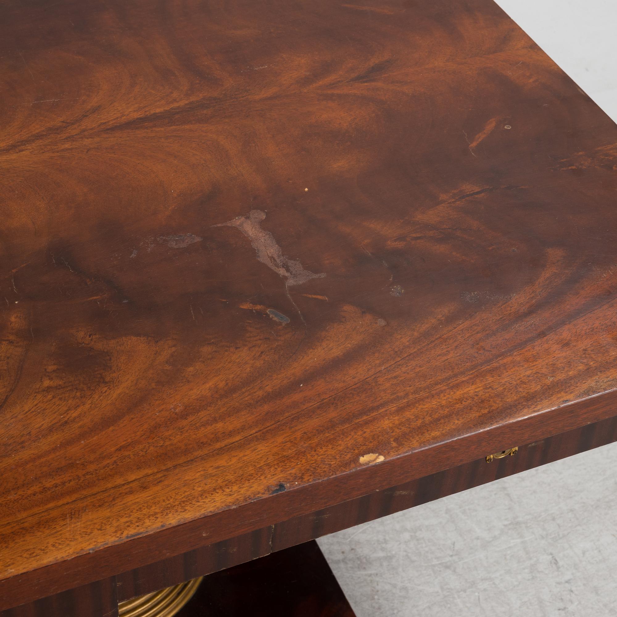 An Empire style library table, first half of the 20th century.