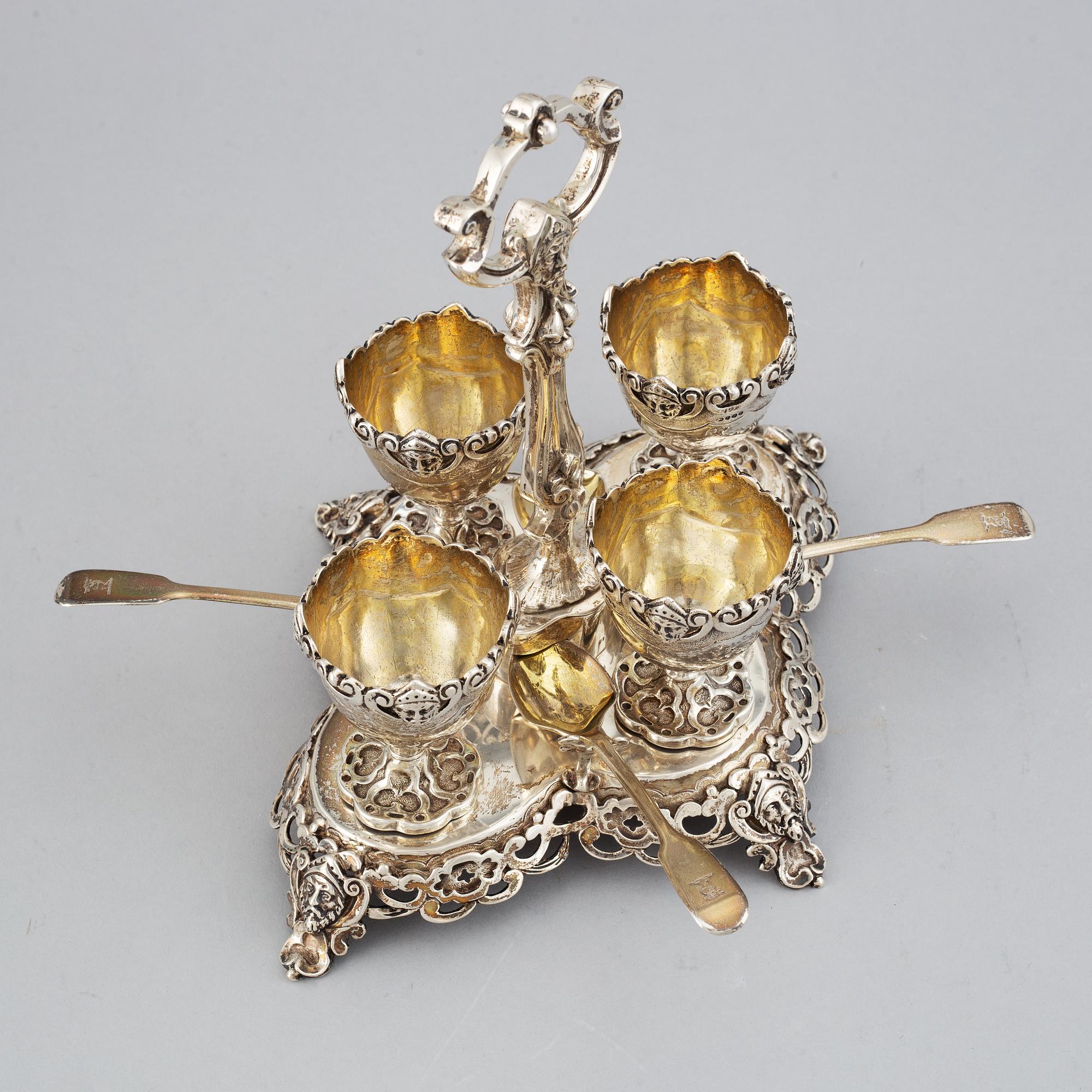 An English silver-gilt egg cruet set, mark of James Charles Edington, London 1857.