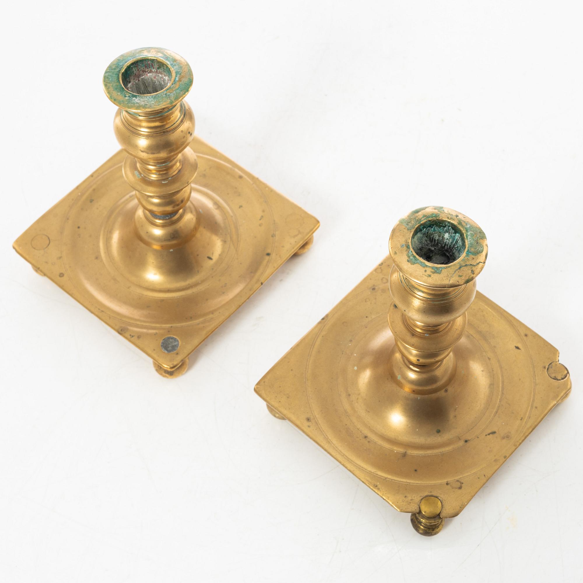 A pair of North European baroque brass candlesticks, circa 1700.