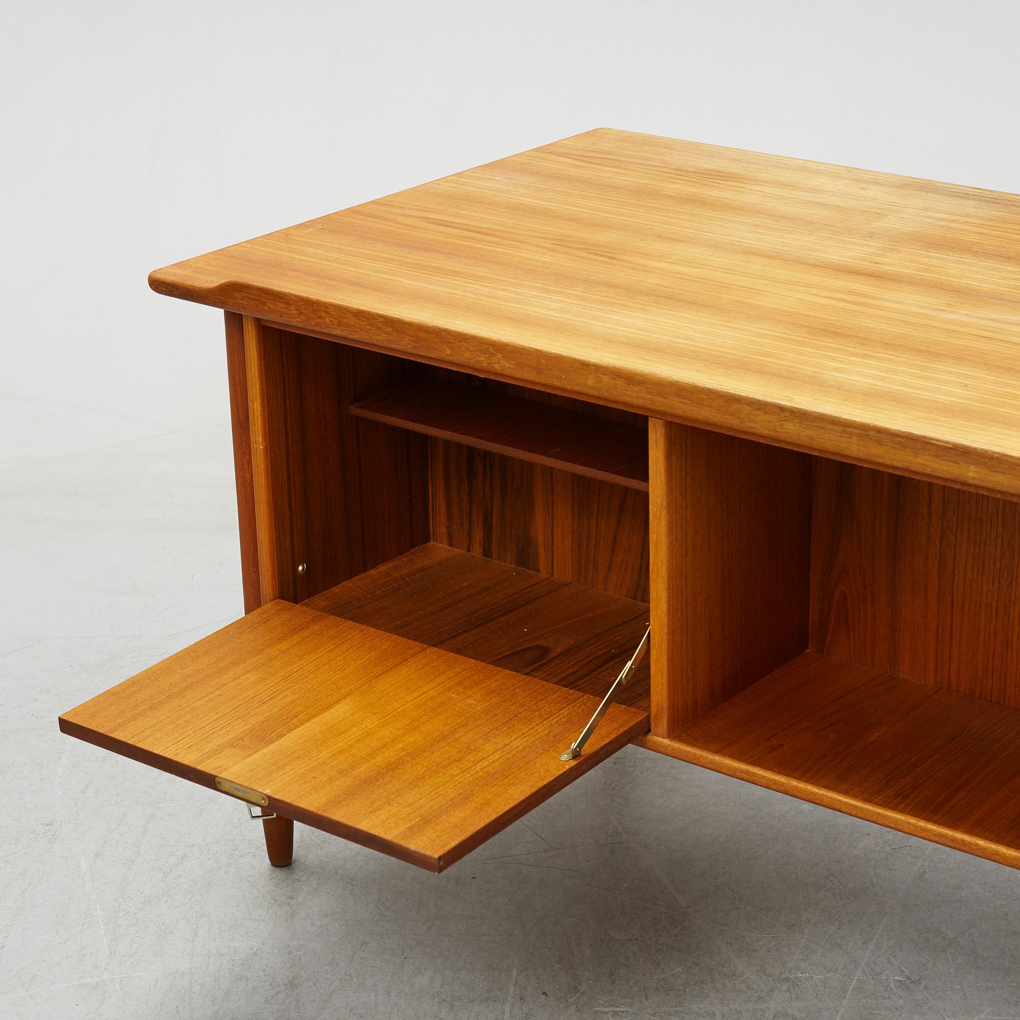 A 1950/60's teak writing desk.