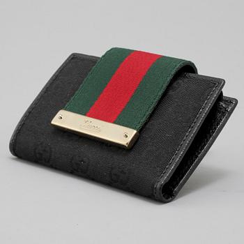 PLÅNBOK, Gucci, "continental wallet", 2000-tal.