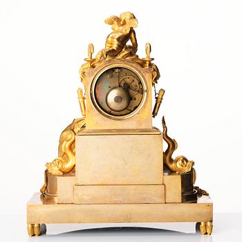 An Empire ormolu mantel clock 'La fontaine de l'Amour', early 19th century.